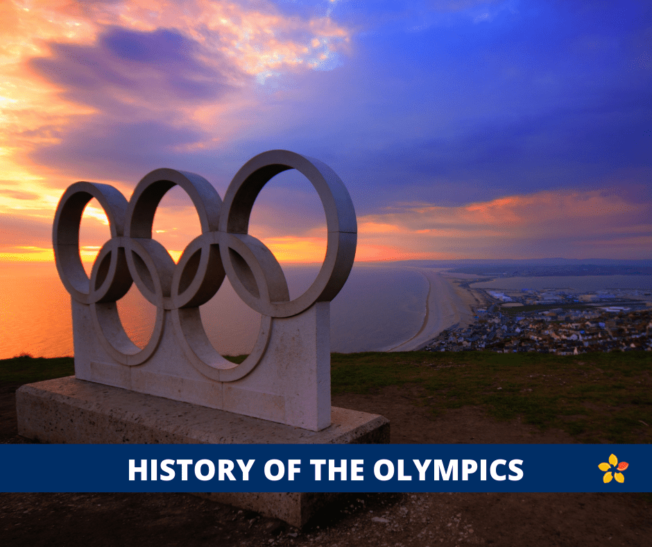 The Olympic Rings in a Statue next to the Ocean