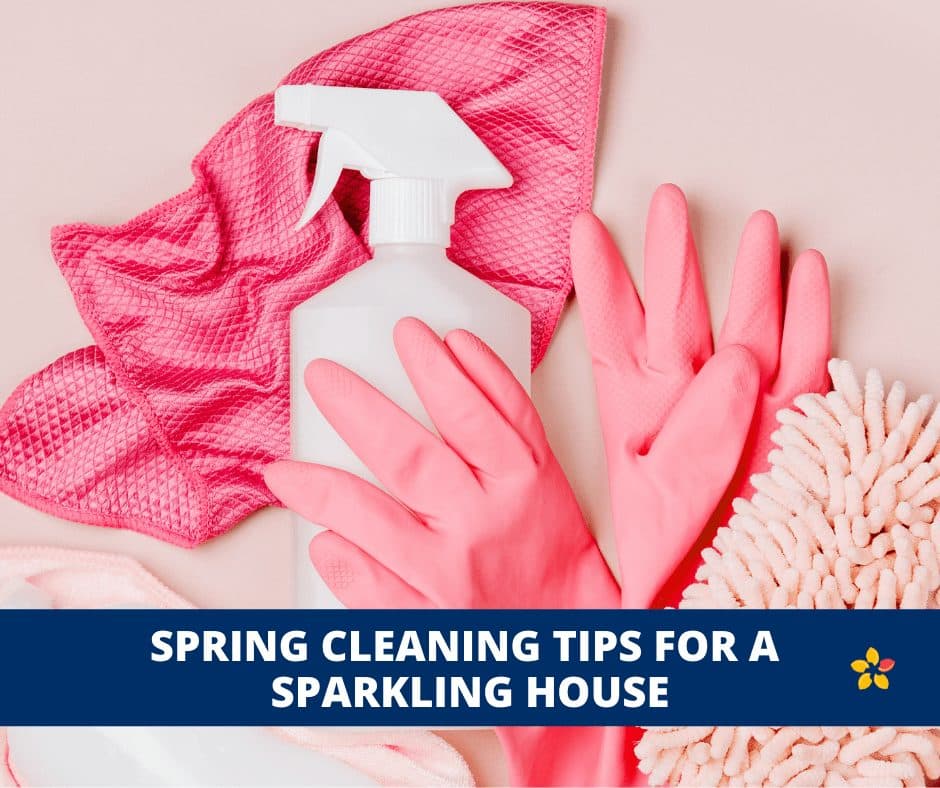 A grouping of pink cleaning materials sits in wait as a way to get some spring cleaning tips.
