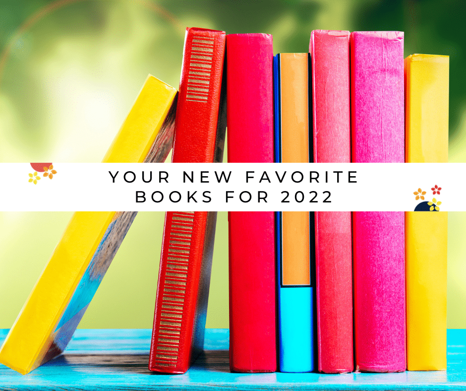 A stack of colorful books is on a table, as we talk about the new best books for the year.